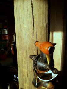 Our exposed post in the kitchen with my husband's 100 year old coffee grinder.